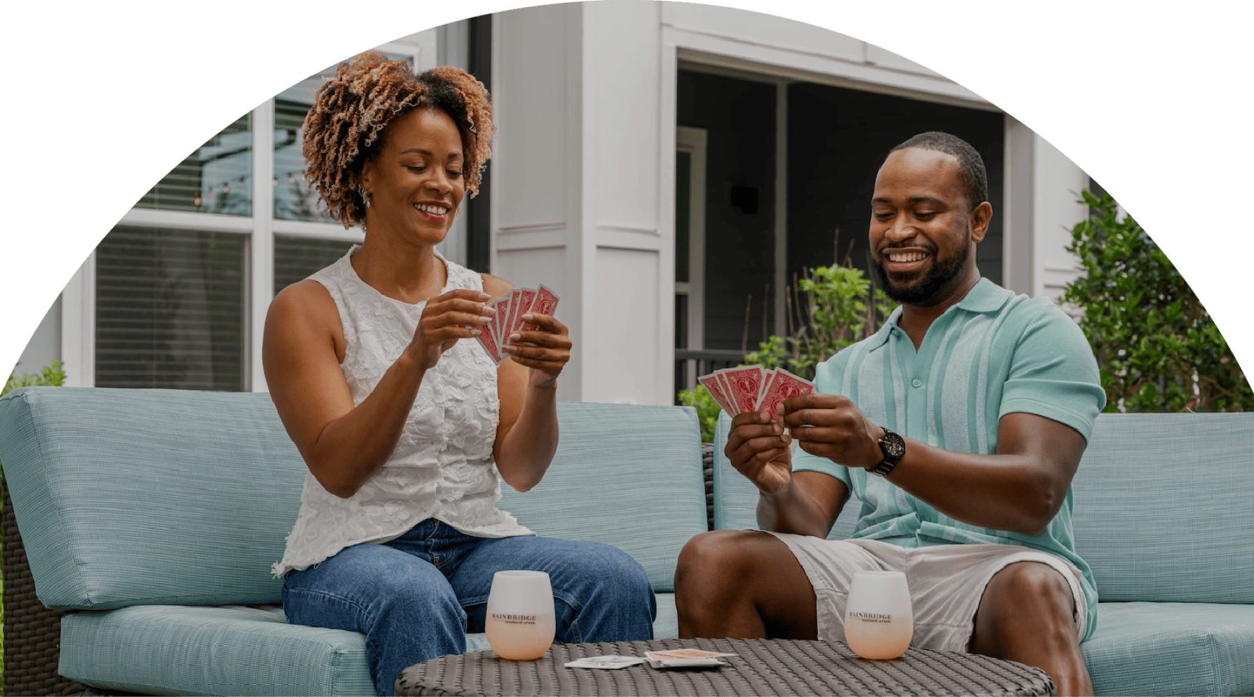 two people playing cards
